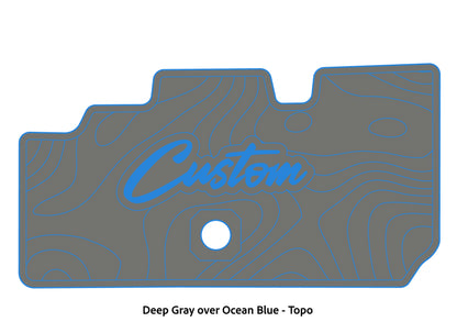 Dura-Deck Basscat Cougar custom EVA foam bass boat flooring in deep gray over ocean blue topo pattern